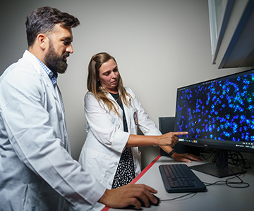 Medical Professionals studying test results on the computer. Links to Under Age 45